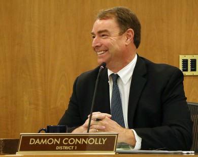 Damon Connolly smiles at the Board of Supervisors meeting.