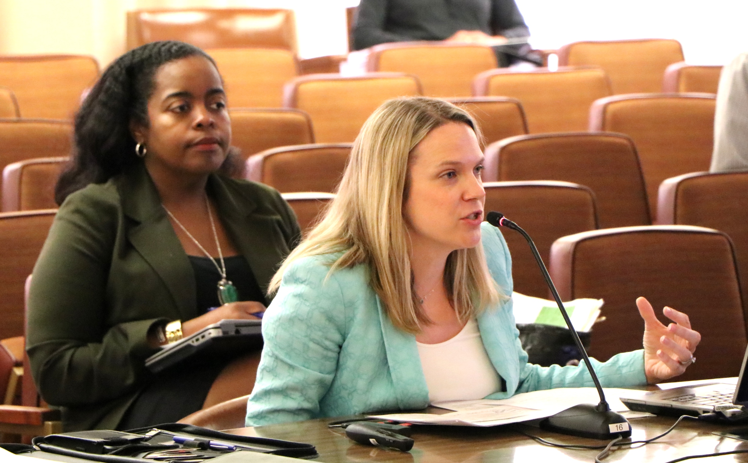 Chantel Walker of Human Resources (left) and Angela Nicholson of the County Administrator's Office present the equity package to the Supervisors.