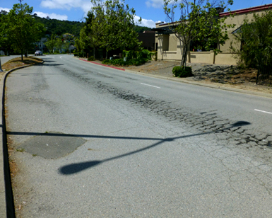 A close-up view of the deterioration on Donahue Street in Marin City.