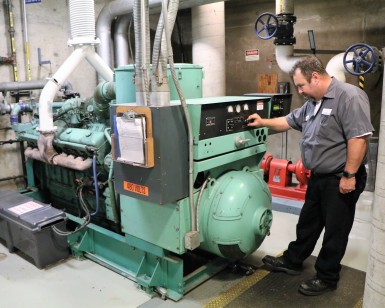 A building maintenance worker checks the diesel-powered generator at the Marin County Civic Center.