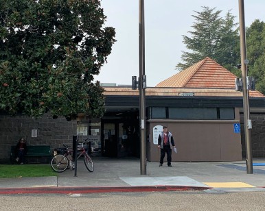 A man walks out of the Novato Library.