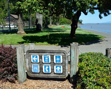 A weather-worn sign is shown at McNears Beach Park near San Rafael.