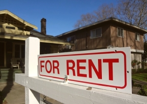 For rent sign in front of a house