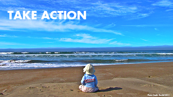 Image of child on beach looking at ocean with "take action" title