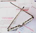 Glasses on top of tax forms
