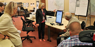 Lynda Roberts showing the Election Advisory Committee, Marin County's new accessible ballot marking device