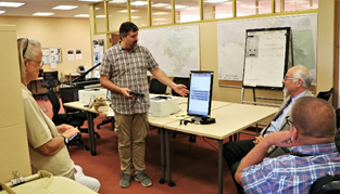 Tony Aquilino showing the Election Advisory Committee, Marin County's new accessible ballot marking device