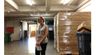Lynda Roberts standing in the Election Department warehouse