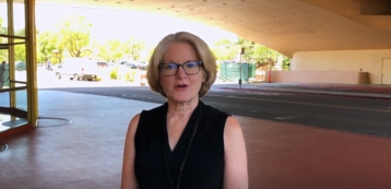 Lynda Roberts in front of the Civic Center entrance