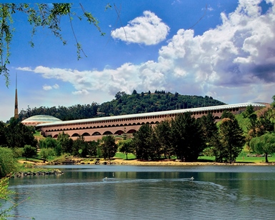 A view of the Civic Center with Lagoon Pond in the foreground