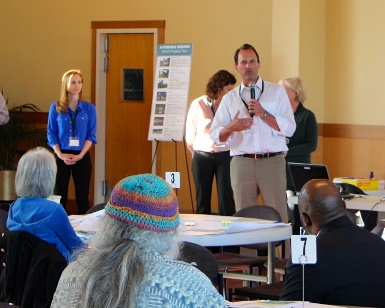 Community Development Agency Director Brian Crawford speaks to a crowd during a 2014 meeting about affordable housing.
