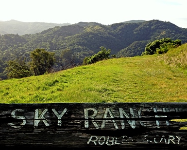 A view of Sky Ranch with a signpost in the foreground