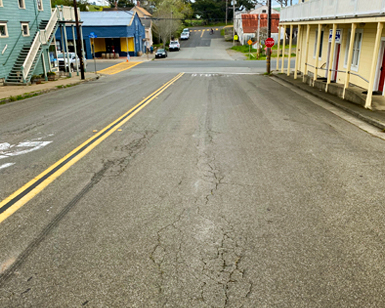 A closeup view of the deteriorated pavement on Dillon Beach Road.