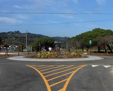 A view of the new roundabout on the Mill Valley-Sausalito Mulituse Pathway, showing an oasis for pedestrians and bikers in the middle of the intersection.