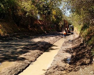 A narrow stretch of Novato Creek, shown near the Warner Creek confluence.