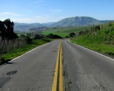A close-up view of the pavement on Point Reyes-Petaluma Road near Nicasio Reservoir.
