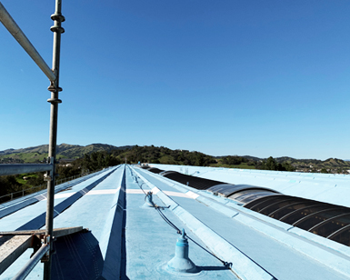 A view of the Civic Center roof from a the perspective of a construction worker standing on the roof.