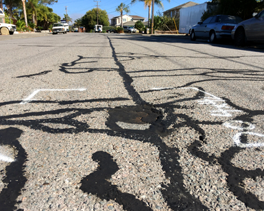 This damaged road in Bel Marin Keys is scheduled for new sealant.
