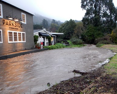Easkoot Creek in Stinson Beach is shown overflowing its banks during a storm in December 2014.