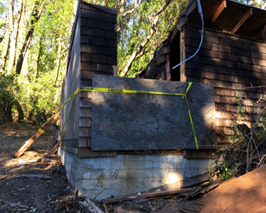 A view of one of several vacant residential and former nursery structures at the Sunnyside Basin location in Fairfax.