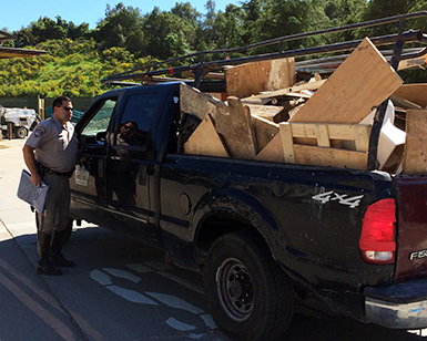 Image of Pickup Truck Hauling Trash