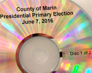 A close-up view of a CD recording with local ballot measure information