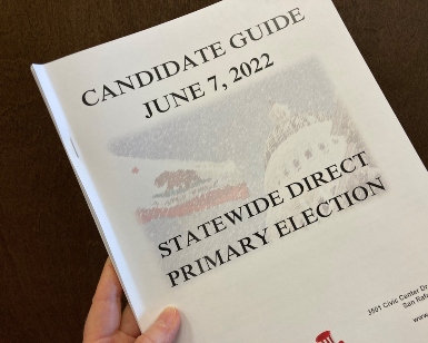 A closeup view of the hard copy version of the Candidate Guide for the June 7, 2022, election