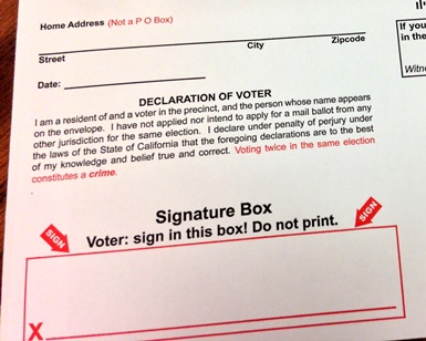A close-up view of a vote-by-mail return envelope
