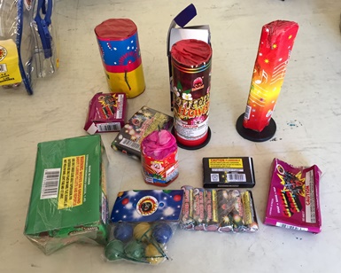 Confiscated fireworks placed on a table.