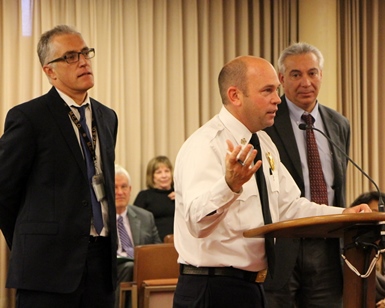From left, Christopher Reilly of the Office of Emergency Services, Fire Chief Jason Weber and Public Works Director Raul Rojas provide a storm preparation update to the Board of Supervisors on December 9, 2014.
