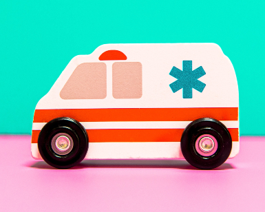 A cartoon graphic image of an ambulance