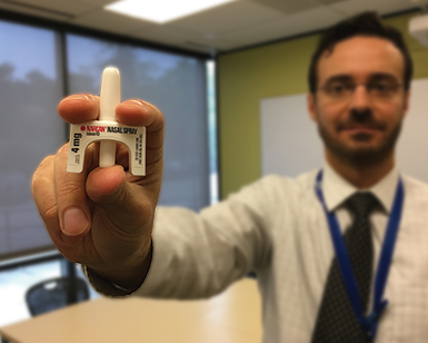 Dr. Jeff DeVido of Marin County Health and Human Services holds up an intranasal naloxone device.