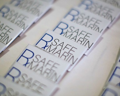 Badge pins that say RxSafe Marin on them.