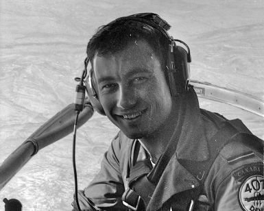 A 1967 photo of Rick Saber in the cockpit of an airborne plan over Vietnam