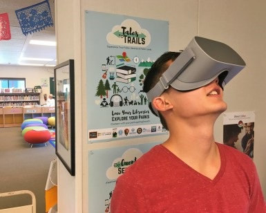 15-year-old Lucas Luu tries out virtual reality at the South Novato Library.