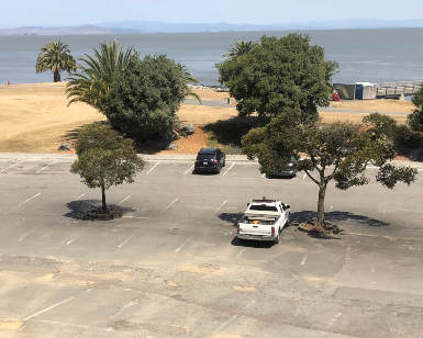 An overhead view of the deteriorated parking lot pavement at the McNears Beach Park.