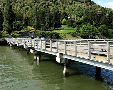 A view of Paradise Beach Park's pier, showing deteriorated railings