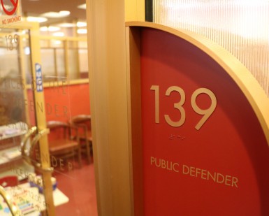 Sign outside the door of the Marin County Public Defender's Office says "139 - Public Defender"