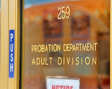 Door signage at the Marin County Civic Center says "Probation Department, Adult Division"