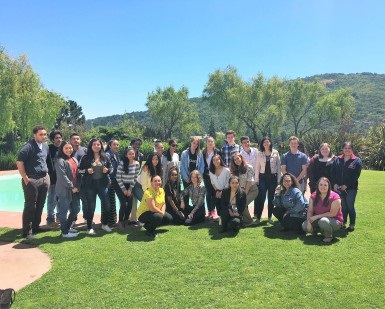 A group photo of all the Career Explorer interns taken on the patio area outside the Civic Center cafe.