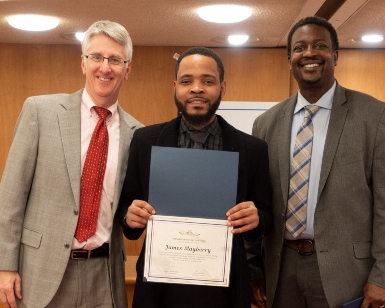 From left, Judge Paul Haakenson, Wall of Change honoree James Mayberry, and Probation Chief Marlon Washington