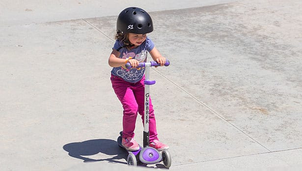 Young girl on scooter