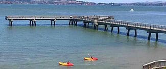 Kayaks near Paradise Beach pier