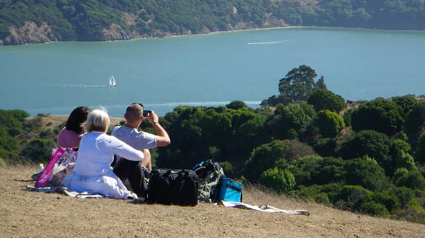 Group having a picnic, looking out at the Bay