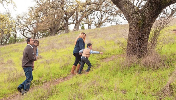 Family hiking on the trail