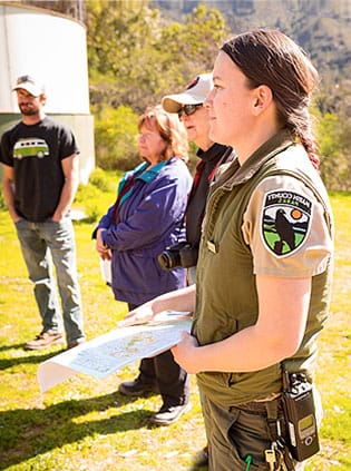 Parks staff discussing a project with members of the community