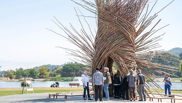 People gathering around the Spirit Nest at Lagoon Park