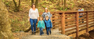 Family walking across the bridge