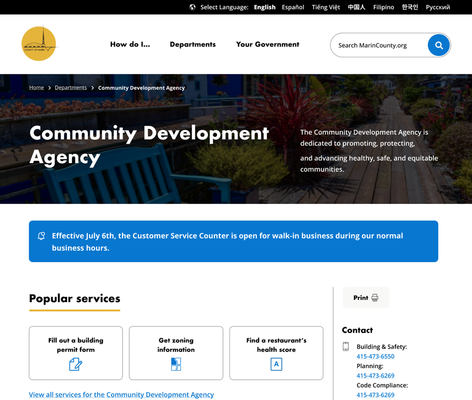 Community Development Agency department page showing sample alert bar followed by a Popular services section and a Contact sidebar.